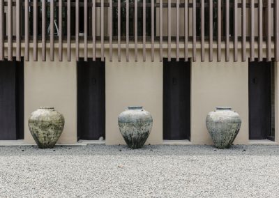 Jars at the entrance to Kachapuri Main Building